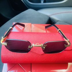 Santos Carti Rimless Sunglasses 