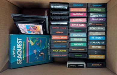 Vintage Atari system with many video games