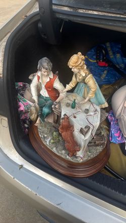 Large Figurine Sculpture on Wooden Base