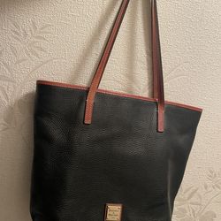 Black pebble, leather Dooney and Bourke tote in great shape