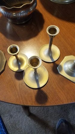 Lots of solid brass candle holders and stuff