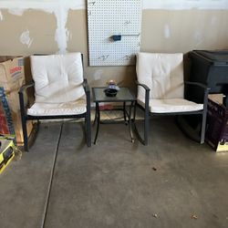 2 Outside Rocking Chairs With Pads 