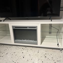 White TV Stand With Glass Shelves And Fireplace