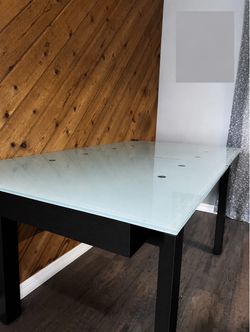 Extendable black glass table