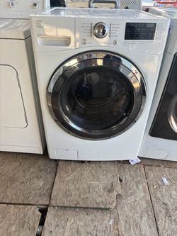 Washer brand LG heavy duty everything works great with a 3 months warranty