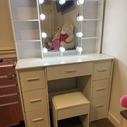 White Vanity Dressing Table with Lighted Mirror anI bought it a week ago and realized that I wanted bigger dresser so I decided to sale it hered Stool