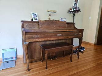 Baldwin . Acrosonic feature. Sounds like a baby grand. Recently tuned. The full service tune costs more than we're asking for the piano.  Pick up only