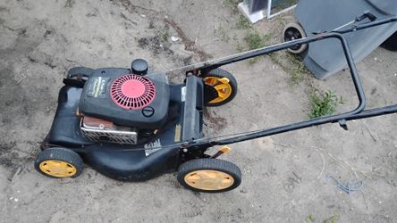 6.75 briggs and Stratton self pulling mower in good shape