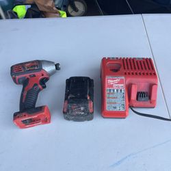 Milwaukee hex impact drill. 4.0 battery and charger. OBO