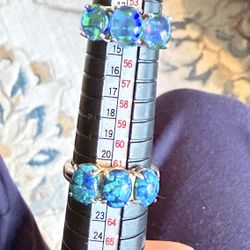 Two Sterling Silver Rings With Opals