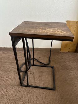 Wood side table with charging ports