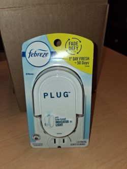 Febreeze plug in scented oil warmer