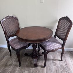 Antique entry  table with 2 wooden canne chairs