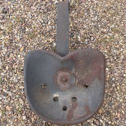 Antique universal tractor seats.