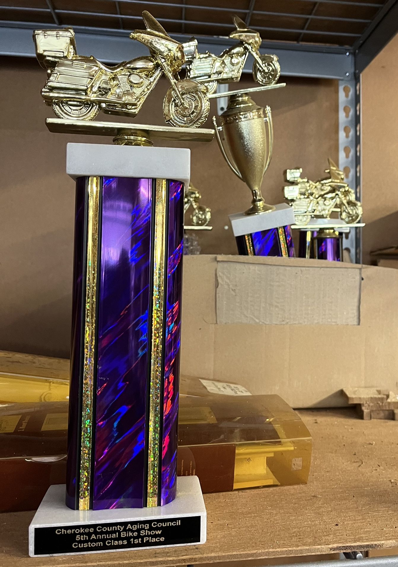 Motorcycle Trophies Of Varying Sizes