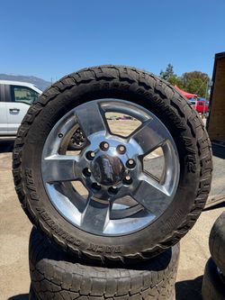 20 inch Chevy 2500 wheels and tires 8x180