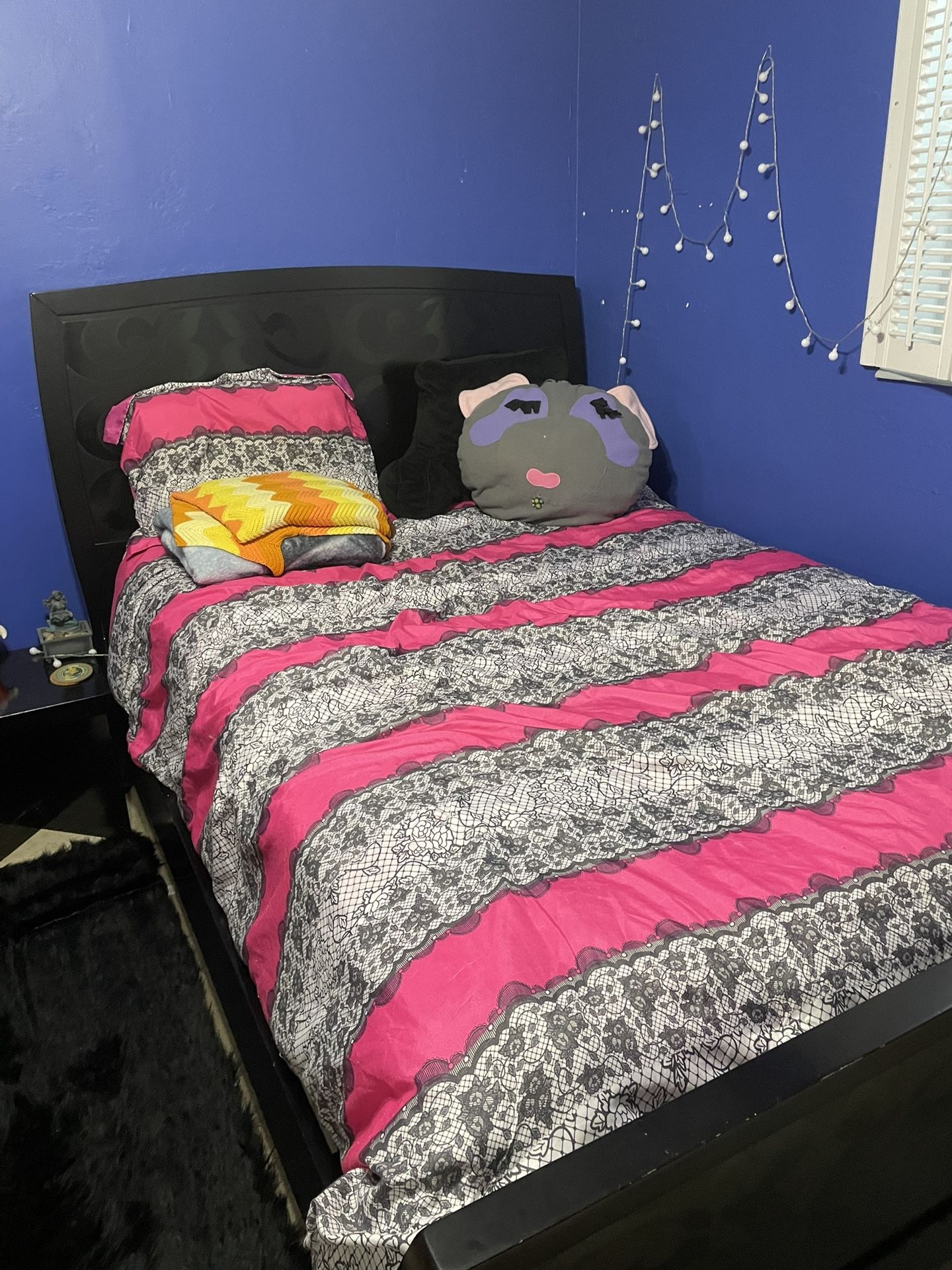 black bed frame and night stand