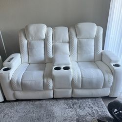 Ashley Furniture.  White Leather Couches