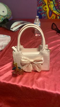 Pink purse with charm