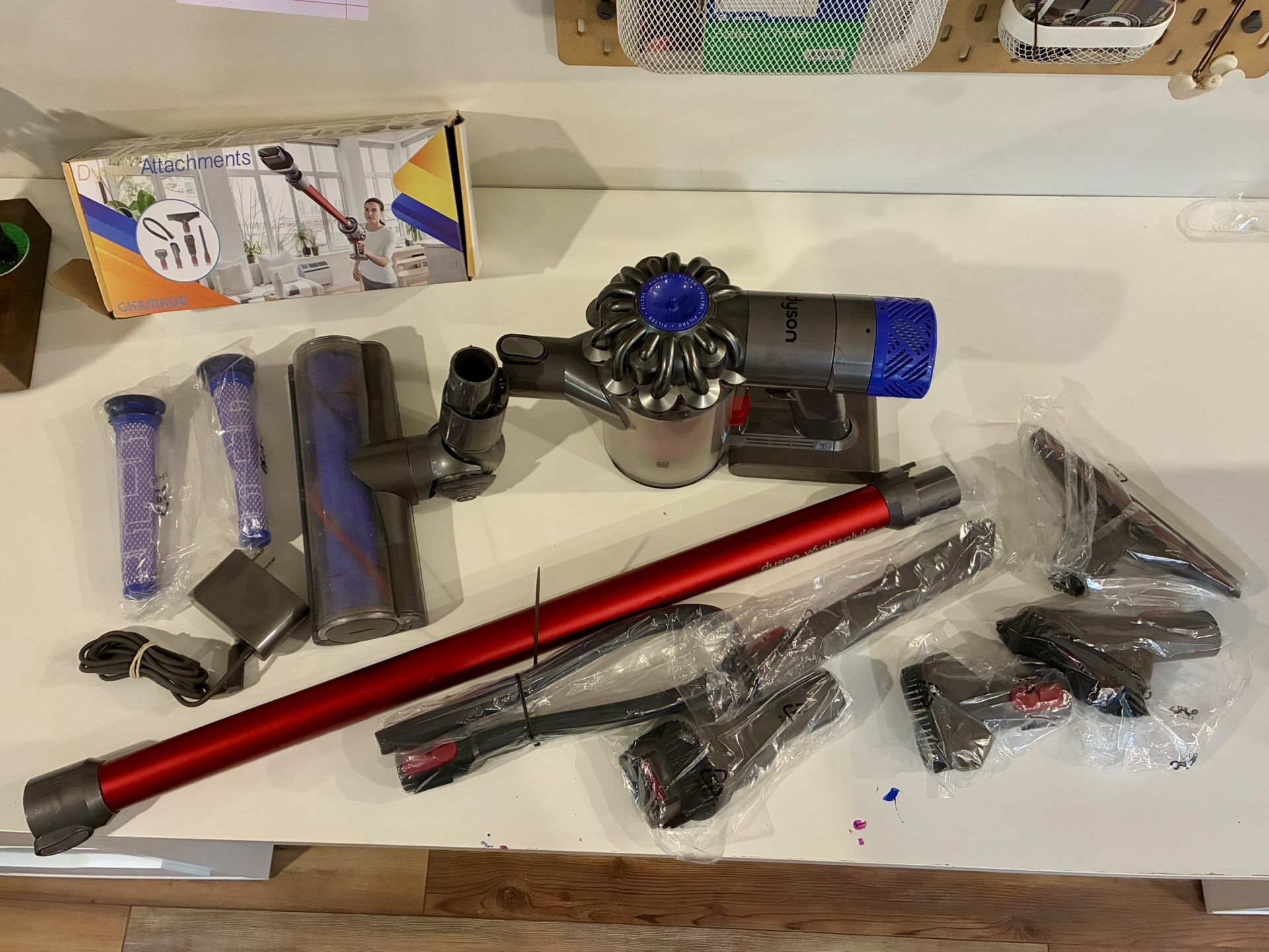 Dyson V6 cordless vacuum w/new accessories