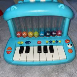 B. Toys Hippo Pop - Play Piano 