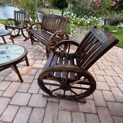 Wood Rustic 5 pc Wagon Wheel patio set. Glider bench, 2 chairs and 2 tables