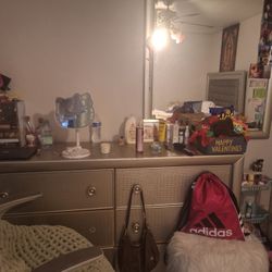 Gray Bed And Big Dresser 