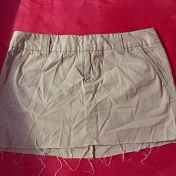 Tan mini skirt with detailed zipper