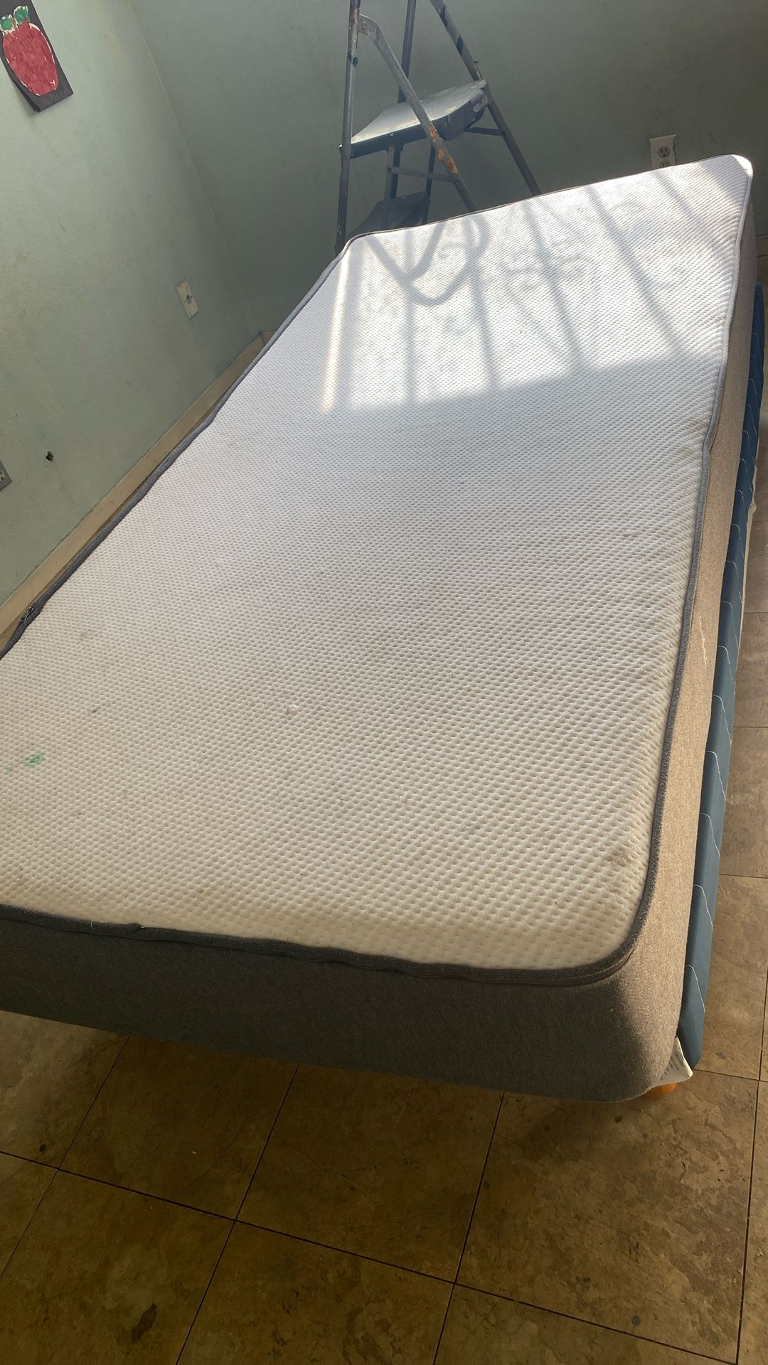 Twin size bed with mattress