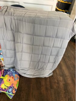 Grey quilted weighted blanket