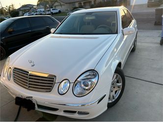 Mercedes-Benz E-Class White Sedan