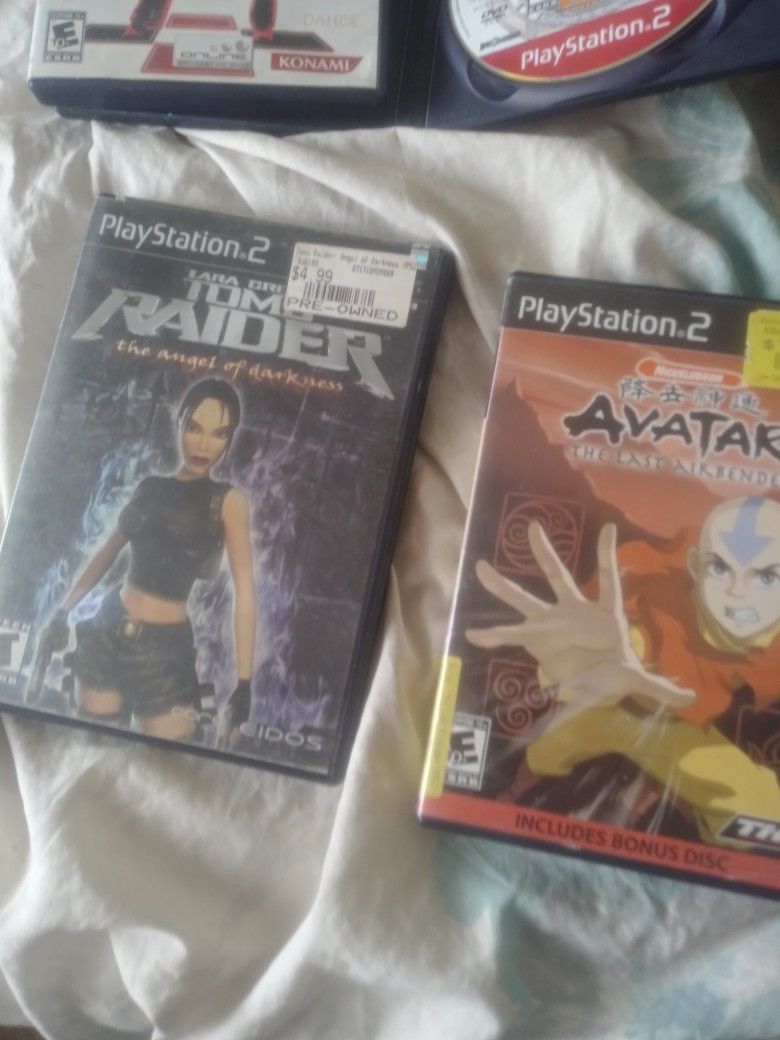 Ps2 With 5 Remotes And Games