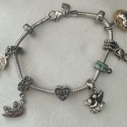 Vintage michael anthony 925 charm bracelet with 9 charms I love you, best mom, my mother, daughter, heart  Marked 33.41 grams   Approx 7.5” in length