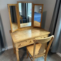 Antique wooden vanity desk with mirror and chair