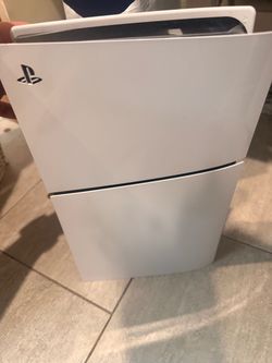 PS5 slim +disc drive add on + all the cables and a DualSense controller
