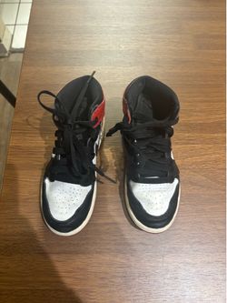 Boys size 11 C black, white and red Nikes