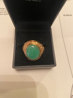 18k gold jade ring size 10.5-11 dragon design on the sides and appraisal certificate