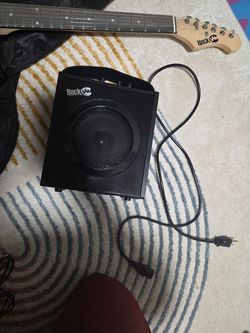 Electric guitar and speaker