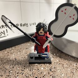 Madara Uchiha with two iconic weapons: a scythe and a large fan Minifigure