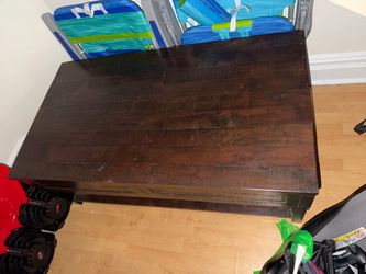 Coffee table with lift top