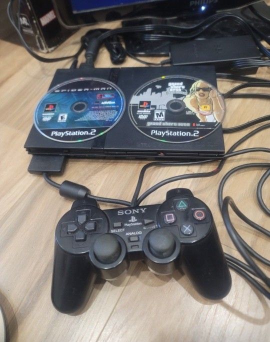 SONY PS2 SLIM WITH 2 GAMES GTA AND SPIDERMAN