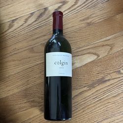 Empty Colgin 2011 Cariad bottle