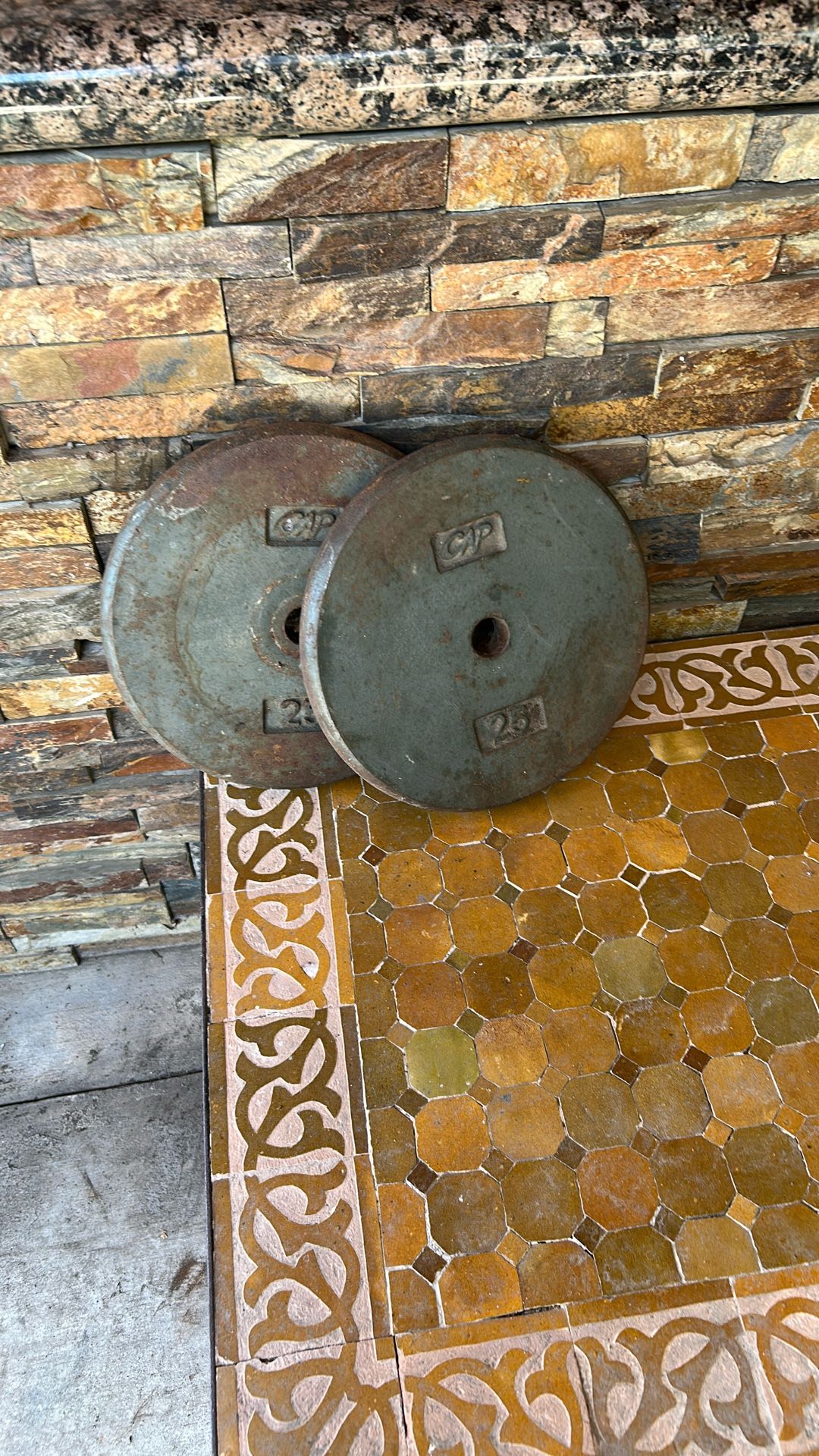 Two 25 pound weights (1” bar)