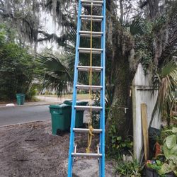 Sturdy blue extension ladder for outdoor use. Blue Keller Extension Ladder24” FiberglassTYPE2 Commercial 225lbsRating. Located Mount Dora Fla 32757.  