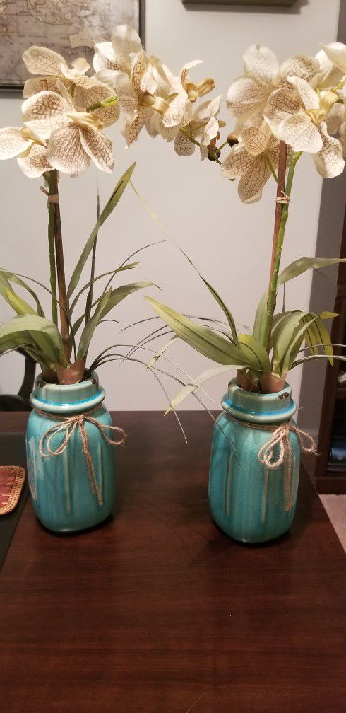 Two fake plants