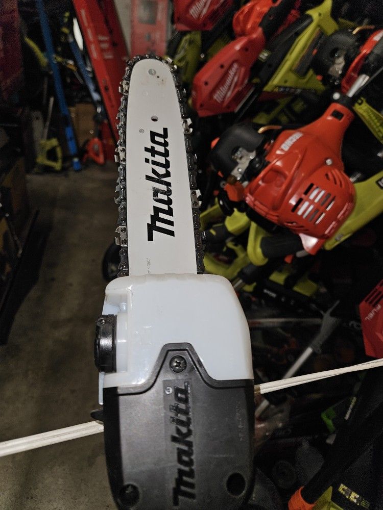 .
Makita
XGT 40V max Brushless Cordless 10in. Telescoping Pole Saw, 13ft. Length (Tool Only)