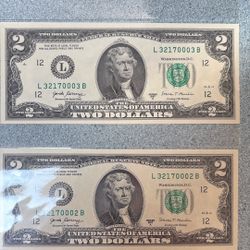 Two Dollar Bills Near Mint Condition