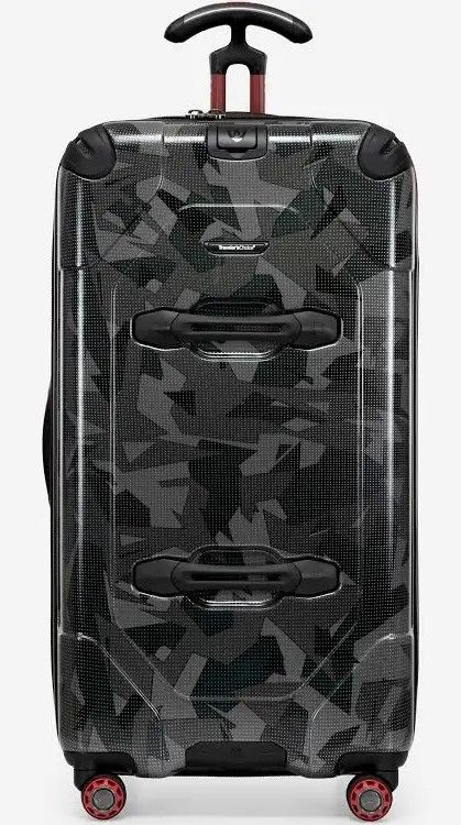 Traveler’s Choice Maxporter Ii 30" Hardside Spinner Trunk Luggage – Expandable camouflage

Black and gray camouflage color style
