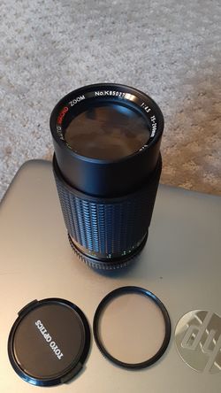 Zoom lense for minolta camera with skylight optional filter!
