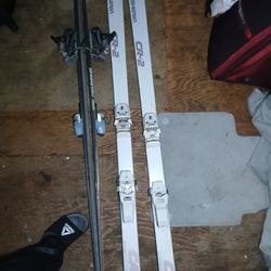 2 Pairs Of Skiis Together